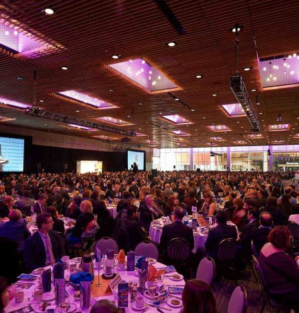 People enjoying a dinner event at the RBC Convention Centre